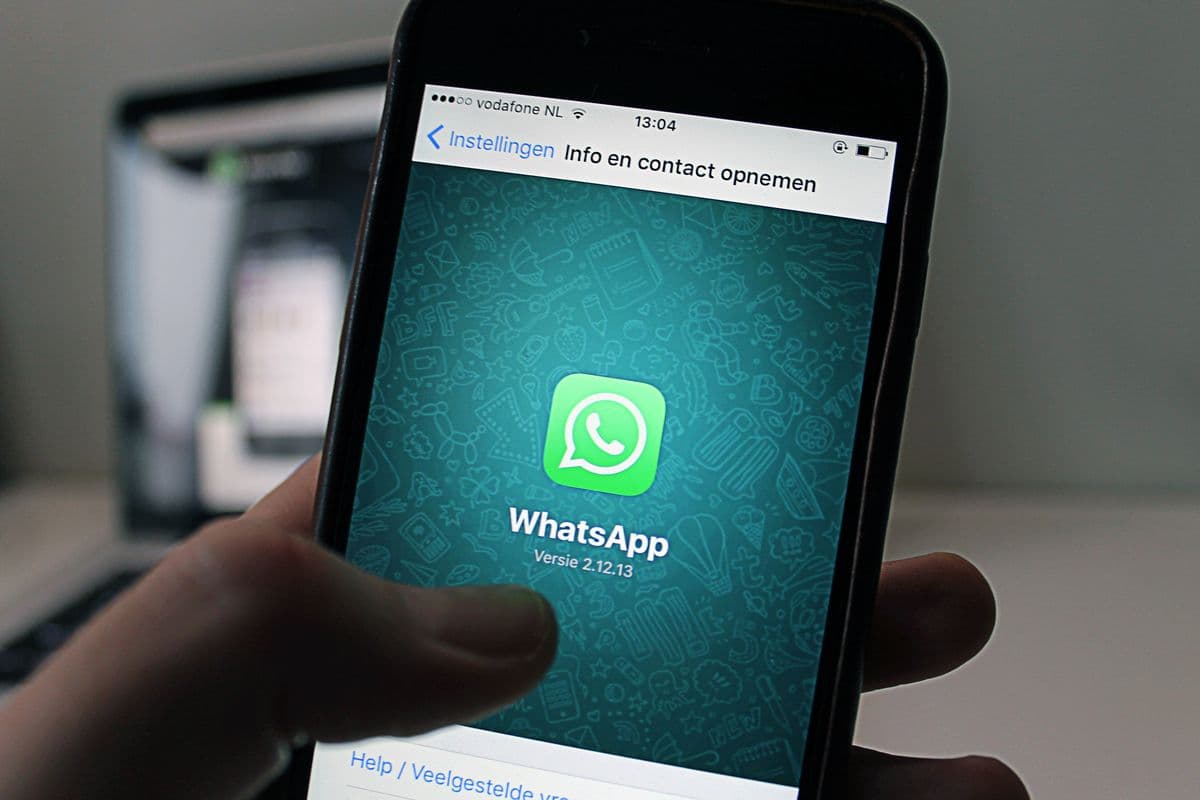WhatsApp and website working together for a Malaysian business — phone showing a click-to-chat button